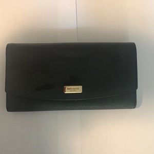 Kate Spade New with tags never used Kate Spade wallet, beautiful black leather